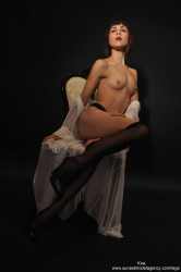 kira-topless-and-stockings-image-28