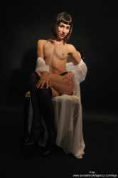 kira-topless-and-stockings-image-24
