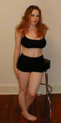 here-is-a-sexy-and-sensual-redhead-kira-image-1